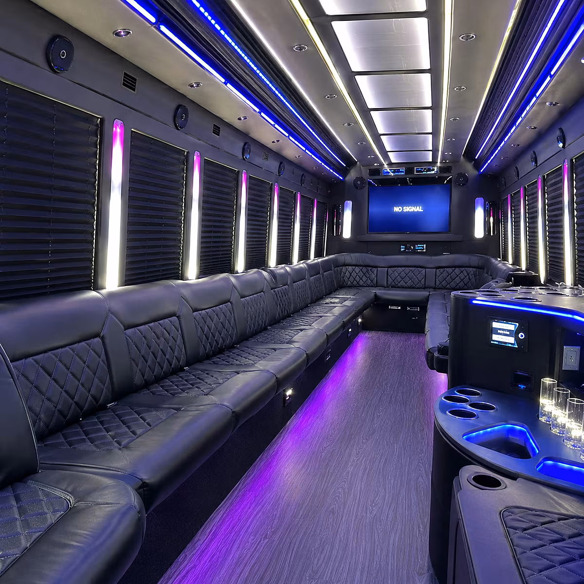Friends laughing during a party bus celebration in Irvine